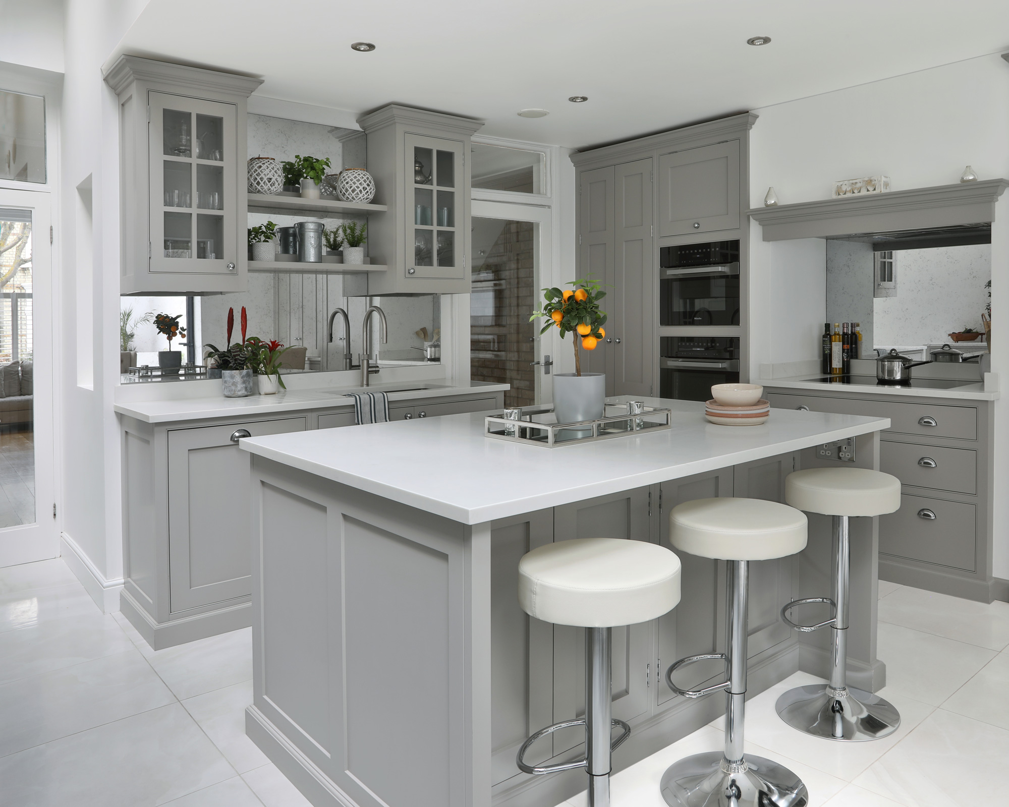 Grey kitchen with decorative crown molding