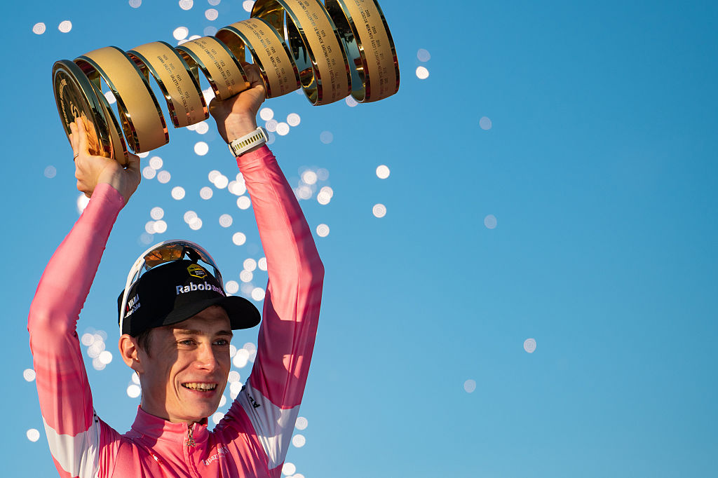 Jonas Vingegaard of Denmark and Team Visma | Lease a Bike celebrates on the podium as the Pink Leader Jersey and overall race winner with the Trofeo Senza Fine during the 109th Giro d'Italia 2026, Stage 21, a 131km stage from Rome to Rome, on May 31, 2026, in Rome, Italy. (Photo by Massimo Valicchia/NurPhoto)