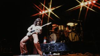 Eddie Van Halen of Van Halen performs on stage playing the guitar on their first Japanese Tour, Shinjuku-kousei-nenkin-hall, Shinjuku, Tokyo, Japan, June 1978