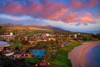 The Sheraton Maui with pink and blue clouds at sunset