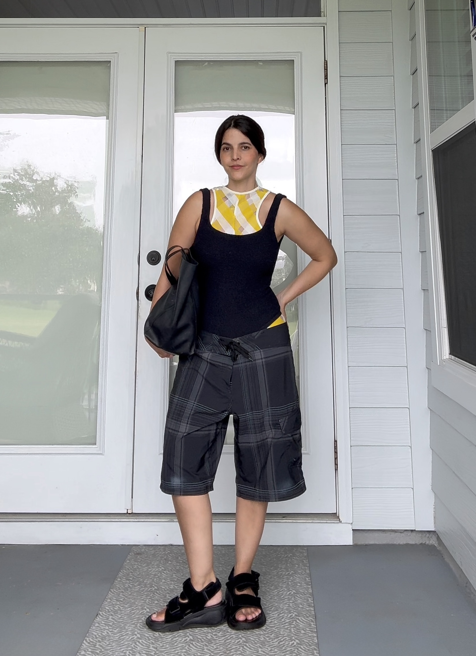 fashion writer Laura Kirk wearing board shorts