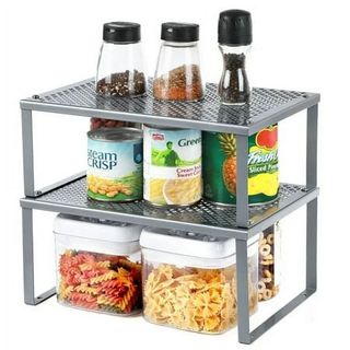 metal can riser with items of food on it