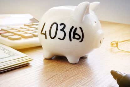 A piggy bank with 403(b) written on it
