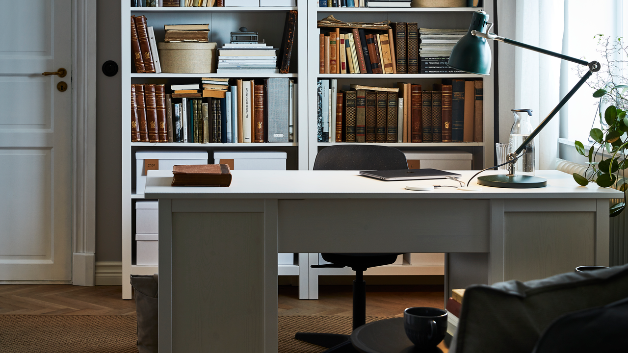 Home office set up with IKEA HAUGA desk and bookcase