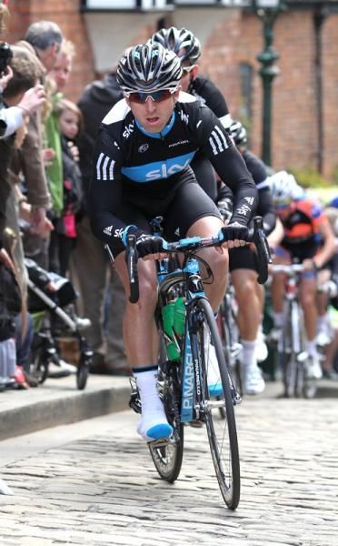 Russell Downing (Team Sky) leads the bunch up the cobbled climb of Michaelgate in Lincoln City.