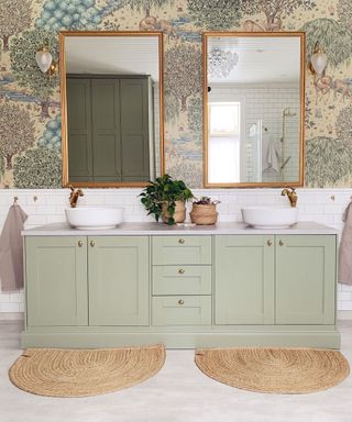 Green IKEA bathroom cabinet with gold mirror