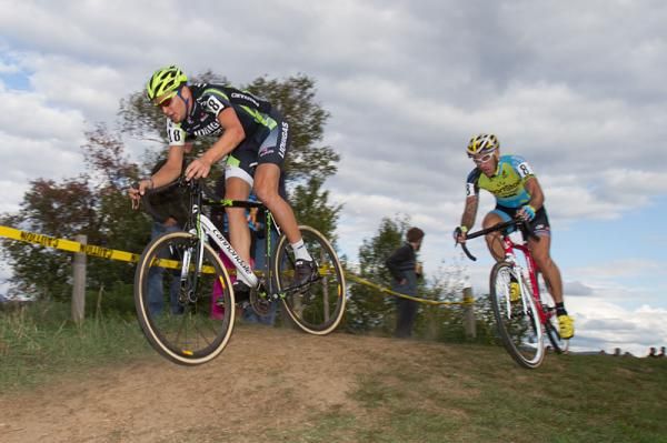 Pro road racer Ted King of Liquigas-Cannondale tests his wheels on the dirt with Adam Myerson of Team SmartStop/Mountain Khakis chasing him down