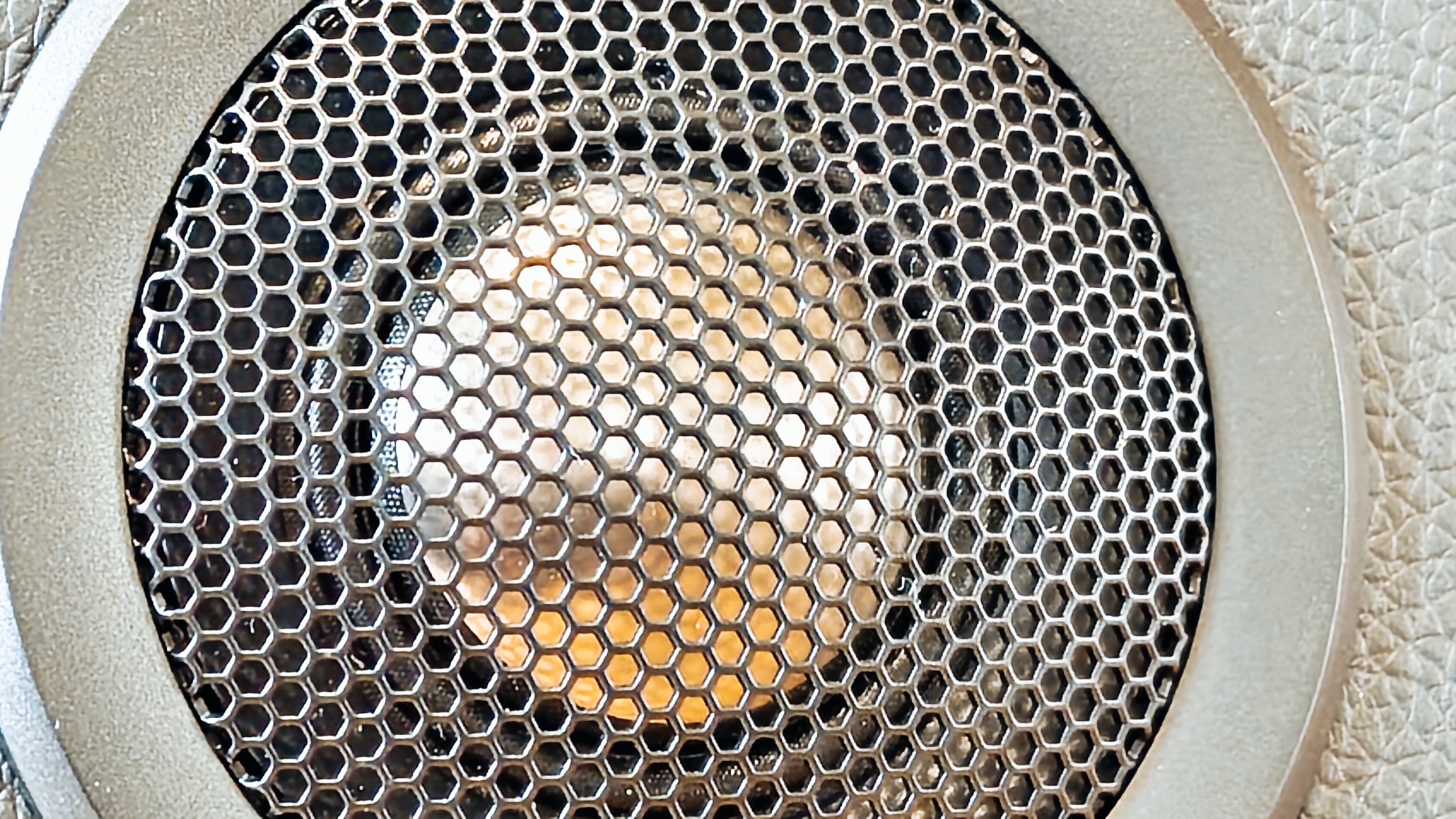 Black and brown Edifier S880DB MkII speakers on a wooden desk