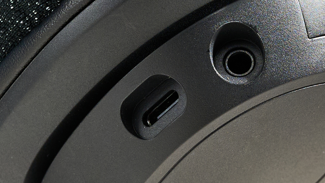 A black Belkin SoundForm Adapt wireless headset