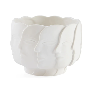 white bowl with overlapping facial design