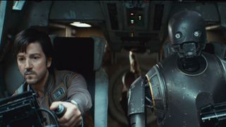 Cassian piloting a U-wing as K-2SO sits in the co-pilot seat in Andor season 2