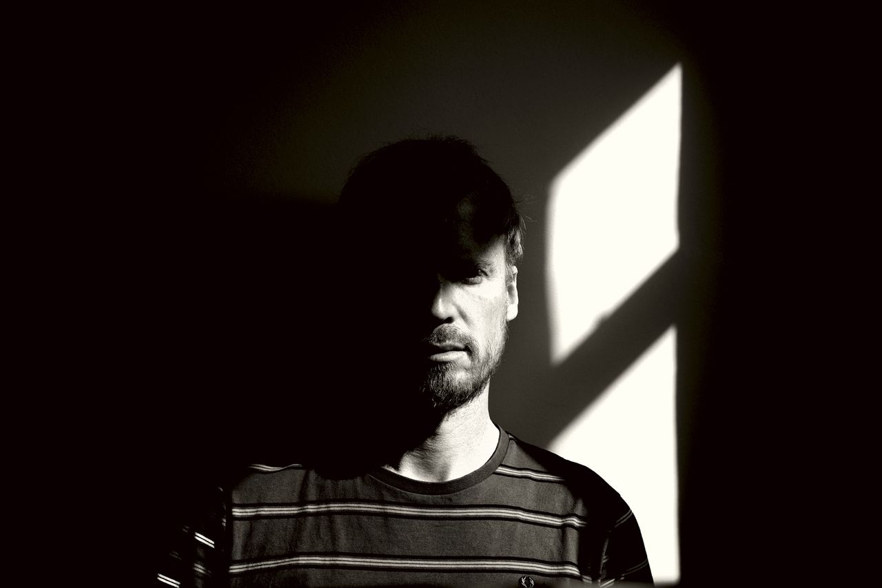 Self portrait window light black and white