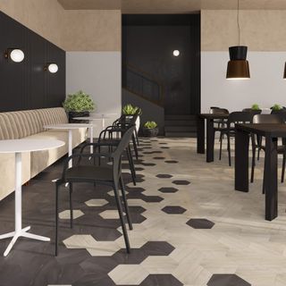 hexagon tiled floor in restaurant by Lucida Surfaces