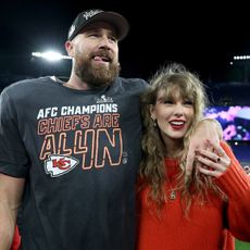 Travis Kelce #87 of the Kansas City Chiefs celebrates with Taylor Swift after a 17-10 victory against the Baltimore Ravens in the AFC Championship Game at M&T Bank Stadium on January 28, 2024 in Baltimore, Maryland.