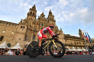 SANTIAGO DE COMPOSTELA SPAIN SEPTEMBER 05 Primoz Roglic of Slovenia and Team Jumbo Visma red leader jersey competes in the Plaza del Obradoiro with the Cathedral in the background during the 76th Tour of Spain 2021 Stage 21 a 338 km Individual Time Trial stage from Padrn to Santiago de Compostela lavuelta LaVuelta21 ITT on September 05 2021 in Santiago de Compostela Spain Photo by Stuart FranklinGetty Images