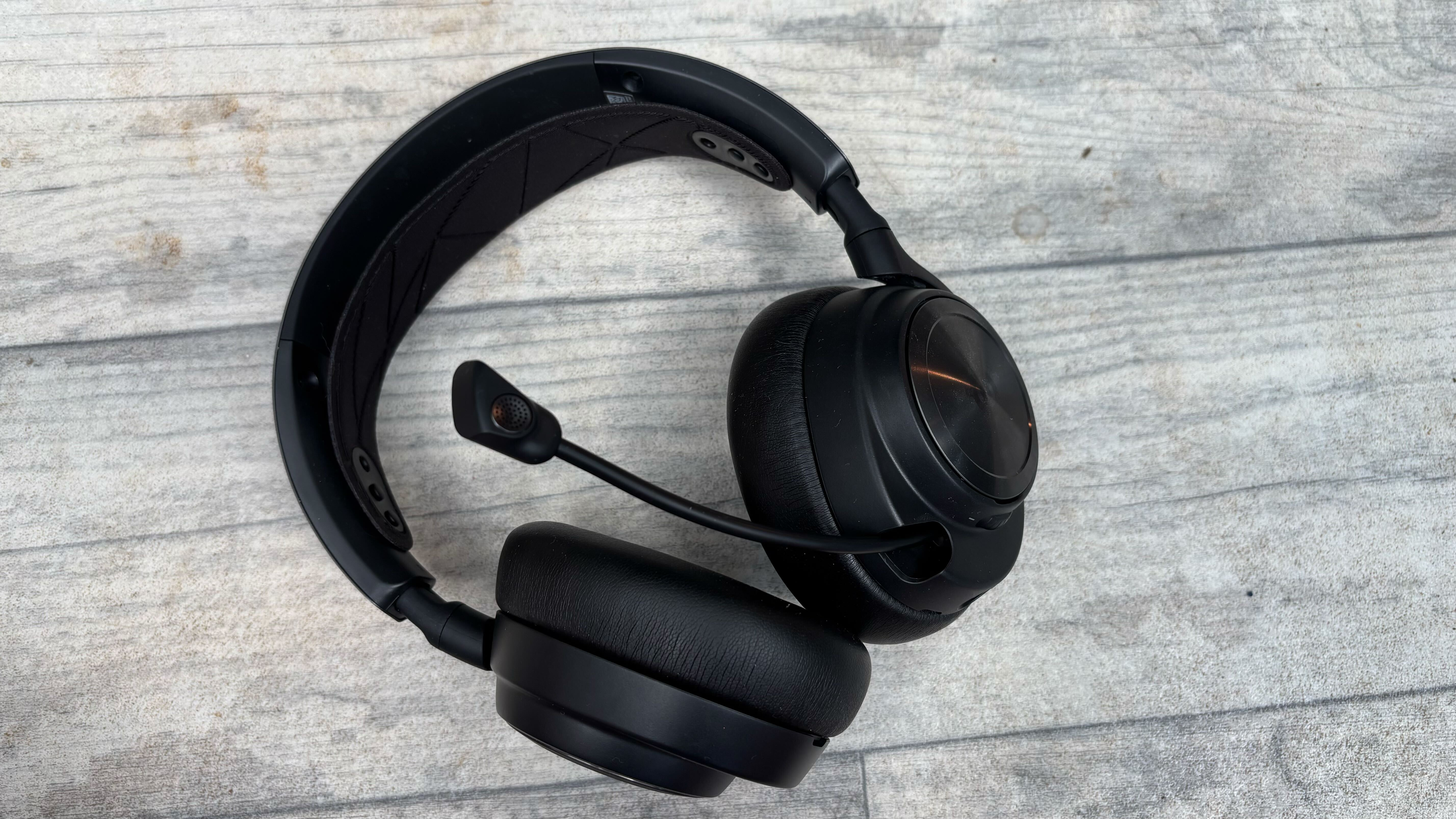 SteelSeries Arctis Nova Pro on a wooden surface