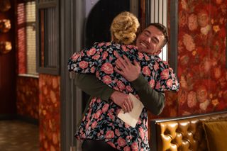 Joel and Leela have a big hug in Hollyoaks.