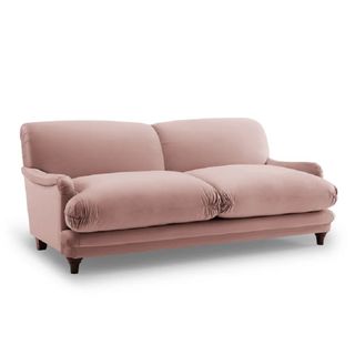 A pink velvet couch
