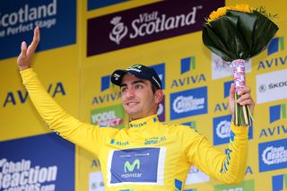 Juan Jose Lobato in yellow on the stage 3 podium.