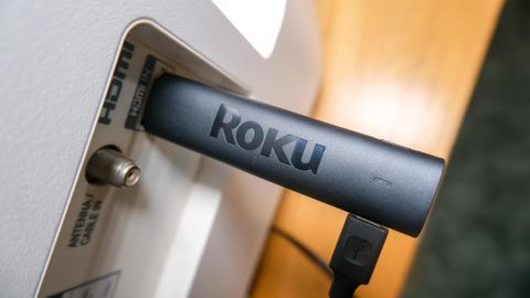 The Roku Streaming Stick 4K plugged into an HDMI port