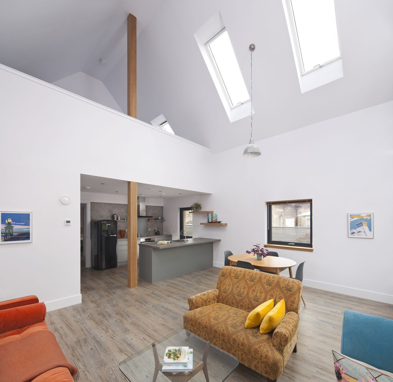 self build home with vaulted ceiling in open plan space