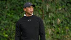 Tiger Woods looks on during a Genesis Invitational practice round