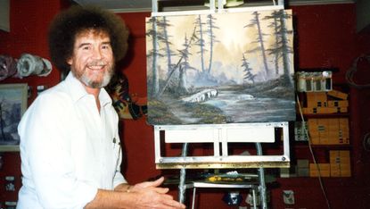 Bob Ross documentary screengrab, showing Bob Ross with a painting of some woods