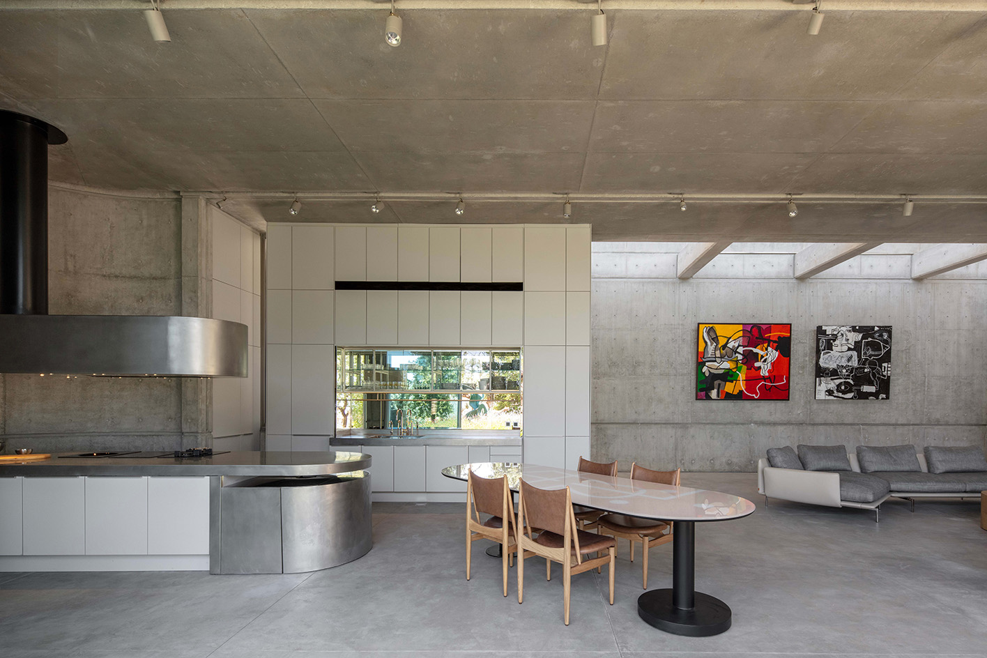 Capsule Retreat by East Architecture Studio, a concrete house in the leafy countryside with tall ceilings and minimalist interiors
