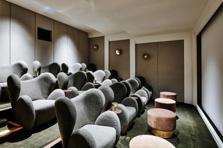 Cinema Room At One Crown Place By Studio Ashby showing lush seating