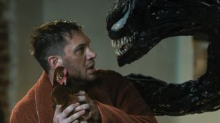 Eddie Brock with a live chicken and Venom in Let There Be Carnage