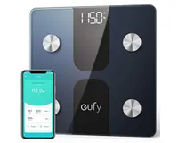 Eufy Smart Scales C1 in black with smartphone on and Eufy app open