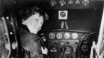 Amelia Earhart in cockpit of plane