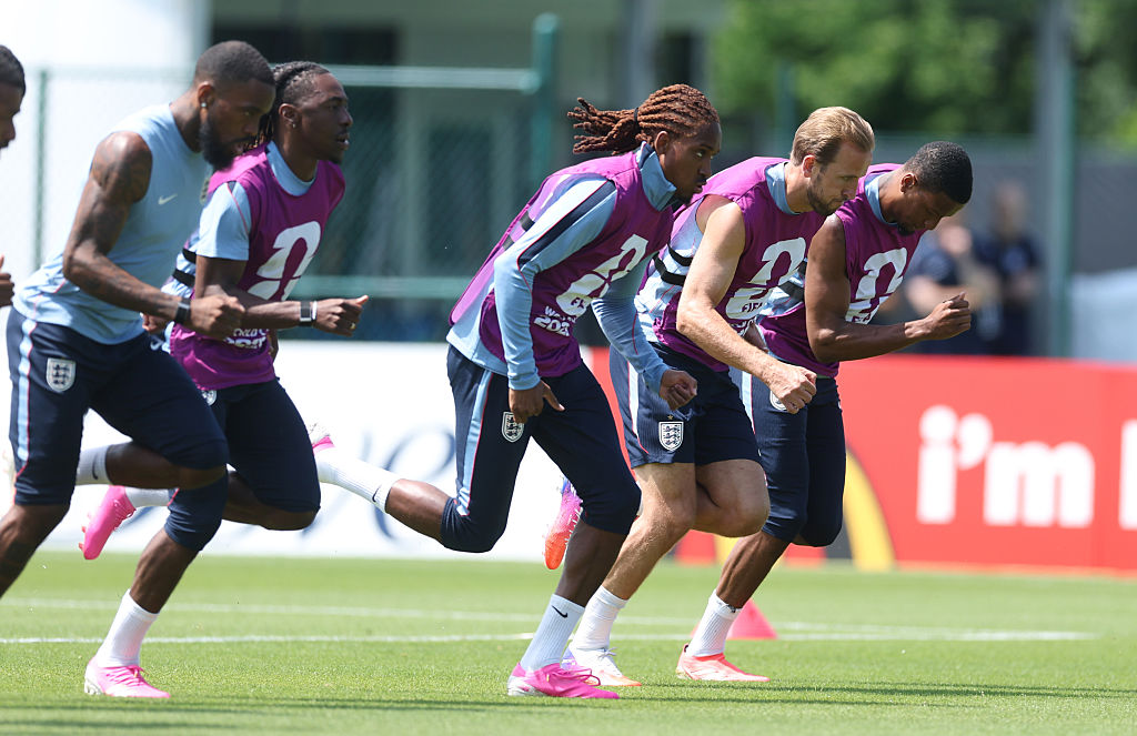 Harry Kane #9 of England  and Djed Spence #25 of England  running in training during the training  of England one day ahead of the FIFA World Cup 2026 Group L match between England and Croatia 