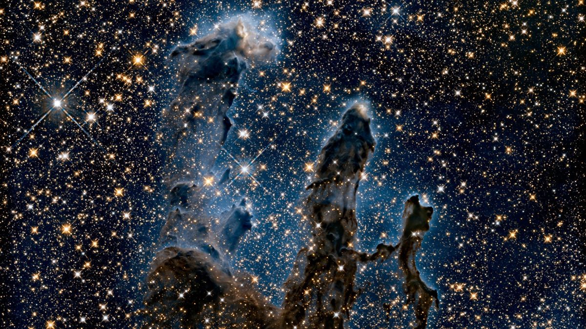 The Eagle Nebula’s Pillars of Creation imaged by the Hubble Space Telescope, in infrared.