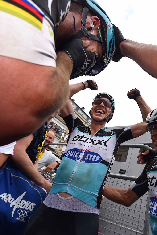 Tony Martin celebrates after winning stage 4 and taking the yellow jersey.
