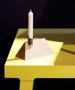 Wooden triangular candle holder