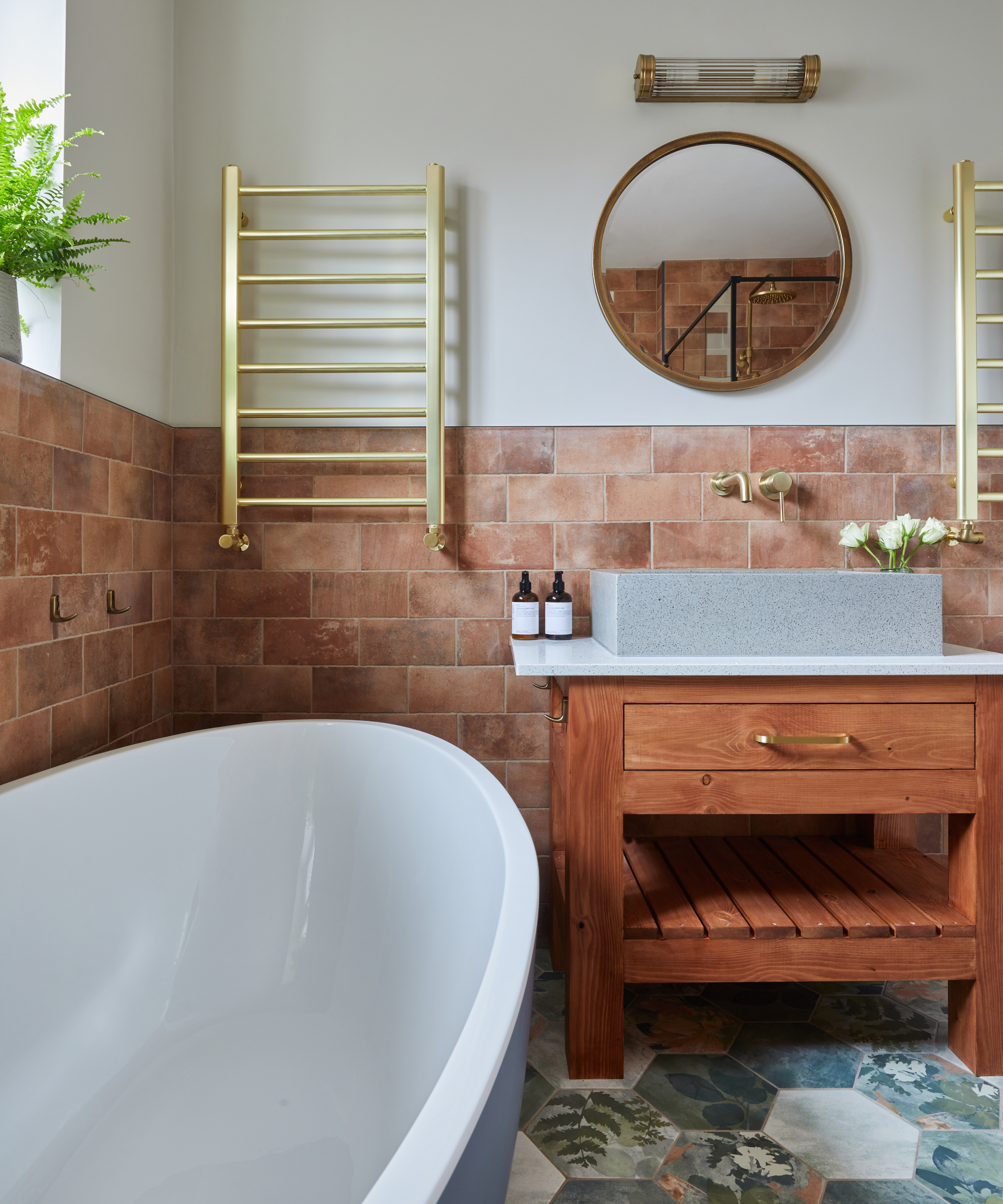 bathroom with half brick walls