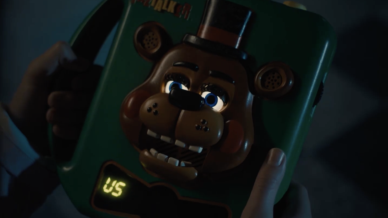 Abby holding Freddy talk box n Five Nights At Freddy's 2