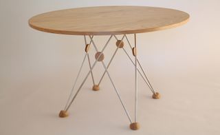 ’Geometry’ by Michael Stevenson, natural wood round table, metal leg & wooden circle design with wooden feet, white room