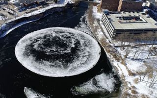 A spinning ice disk in the Presumpscot River in Westbrook, Maine, is shown In this aerial image taken from a drone video.
