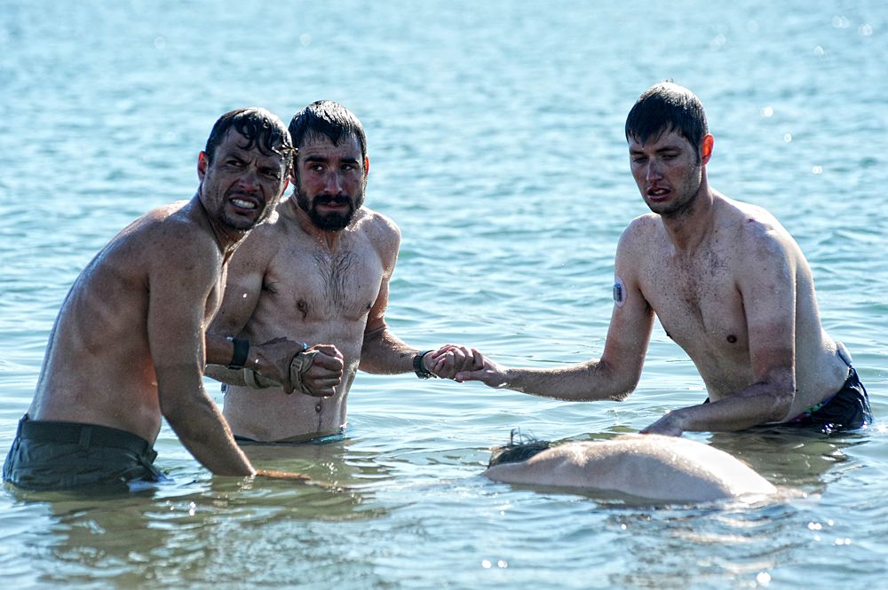 Novo Nordisk riders getting in the cold water at their team-building with former US Navy SEALs