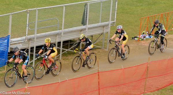 Laura Van Gilder (C3/Mellow Mushroom Pizza) pacing the lead group around the cinder track