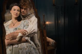 claire and jamie embracing in outlander