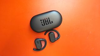 JBL Soundgear sense on an orange background