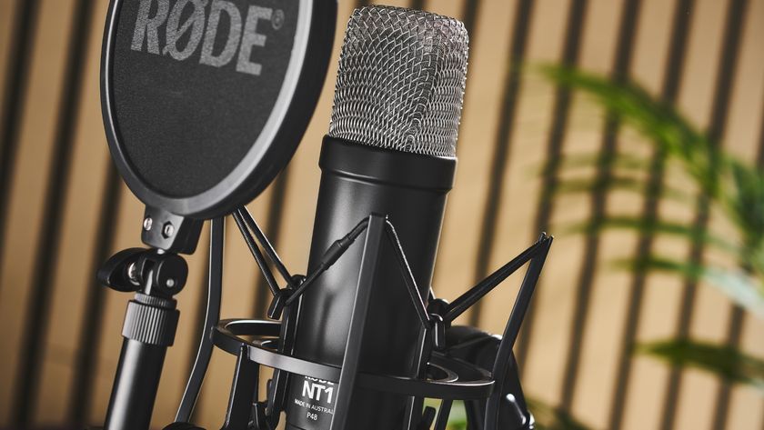 A Rode NT1 Signature Series microphone with shock mount and pop shield in a studio