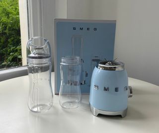 Smeg personal blender in front of box