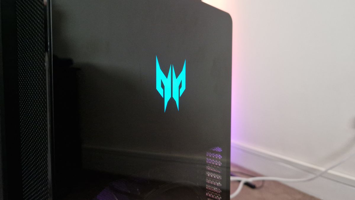 Acer Predator Orion 7000's frontal Predator logo shining blue close-up