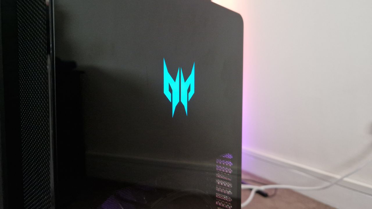 Acer Predator Orion 7000's frontal Predator logo shining blue close-up