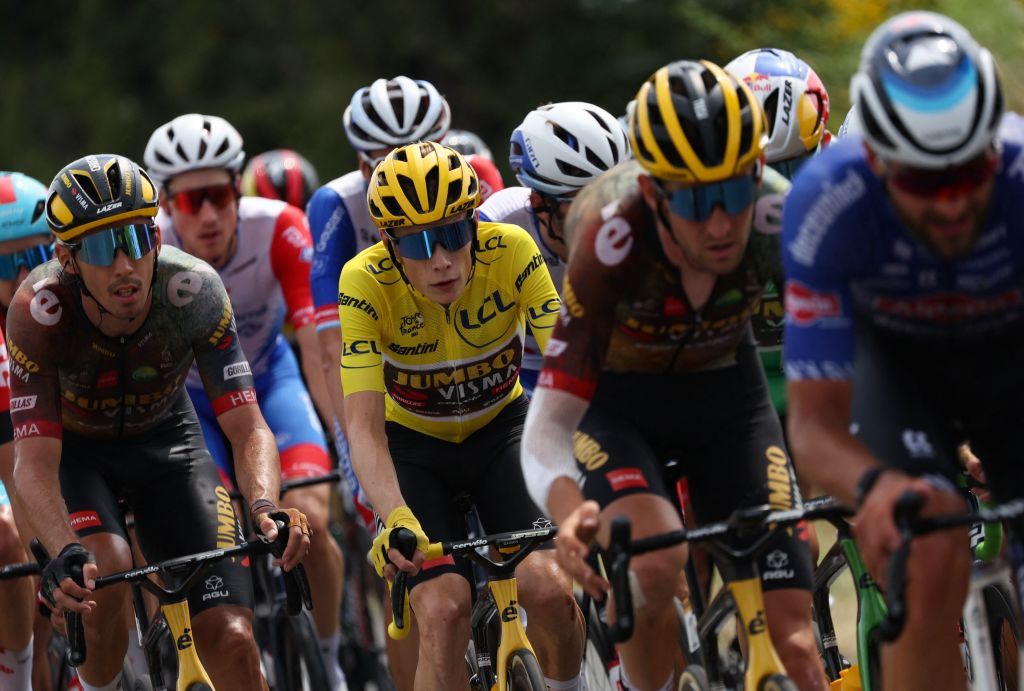 JumboVisma teams Danish rider Jonas Vingegaard wearing the overall leaders yellow jersey C cycles with the pack during the 19th stage of the 109th edition of the Tour de France cycling race 1883 km between CastelnauMagnoac and Cahors in southwestern France on July 22 2022 Photo by Thomas SAMSON AFP Photo by THOMAS SAMSONAFP via Getty Images