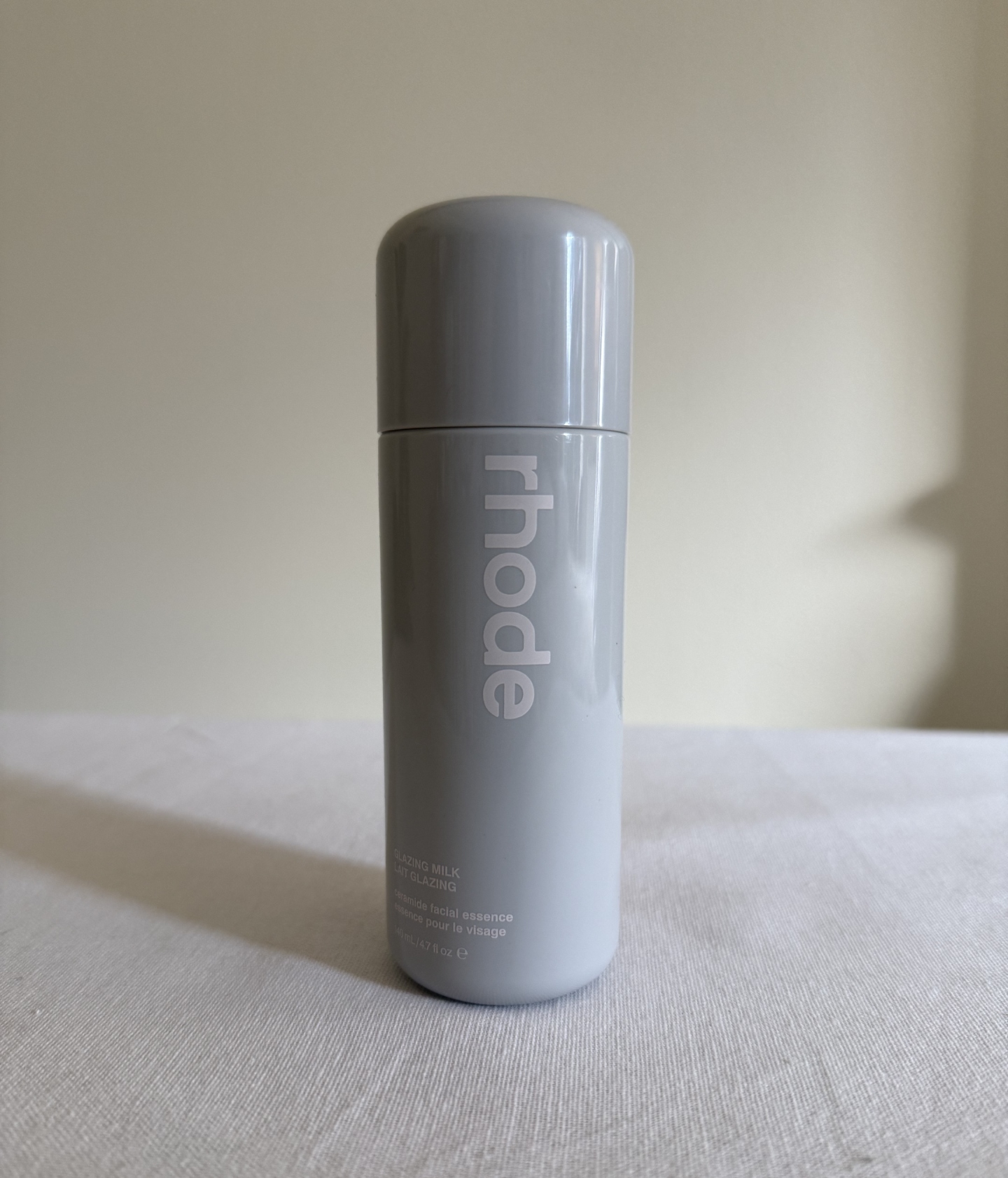 Rhode's Glazing Milk pictured by Associate Beauty Editor Maya Thomas